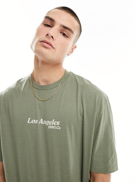 ASOS DESIGN oversized t-shirt in khaki with Los Angeles chest print