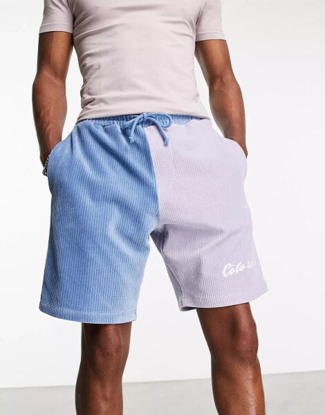 ASOS DESIGN oversized shorts in blue ribbed velour with embroidery