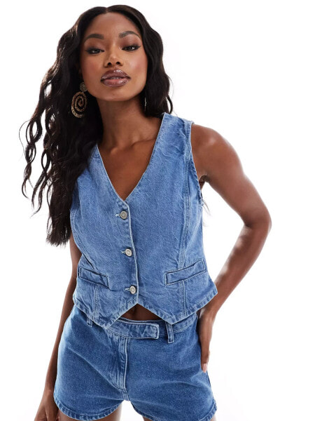 In The Style x Perrie Sian denim waistcoat in blue