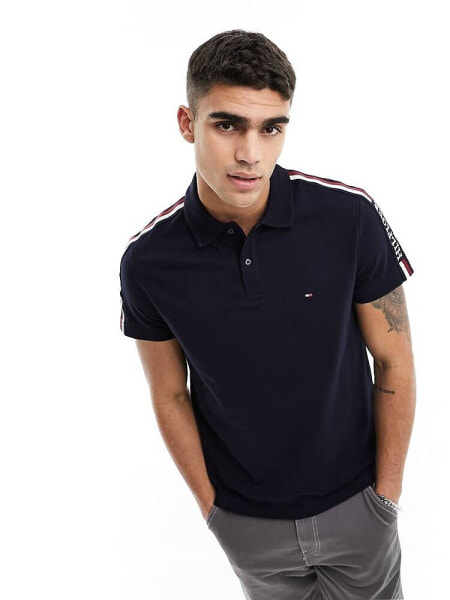 Tommy Hilfiger global stripe monotype regular polo shirt in Navy