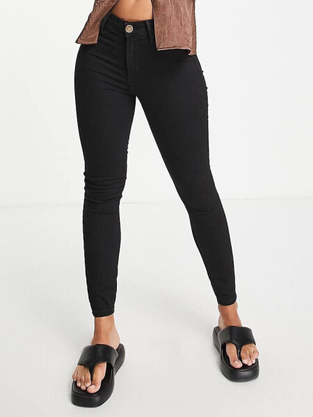 River Island Molly mid rise reform skinny jeans in black	