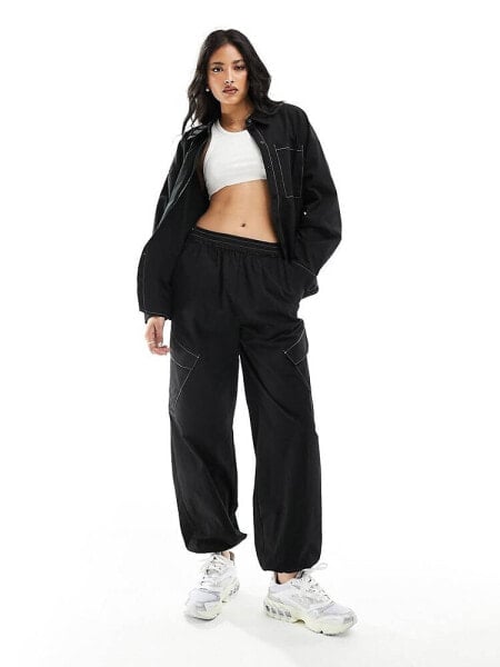 Pieces contrast stitch cargo trousers co-ord in black