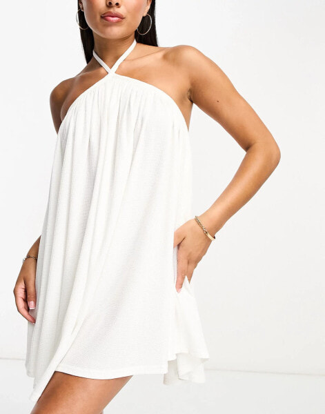 The Frolic sunstone halter volume mini summer dress in white waffle