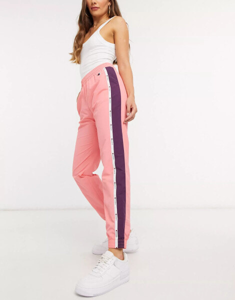 Champion logo track pants in pink