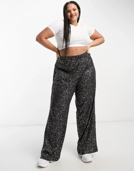 ONLY Curve wide leg trousers in black and gold