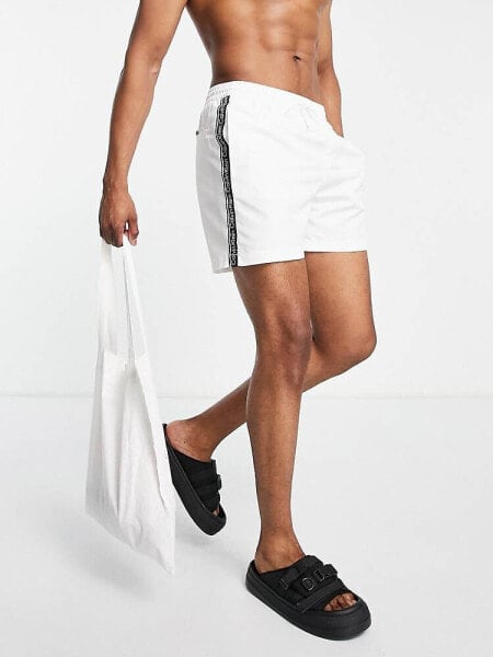 Calvin Klein core logo swim shorts in white