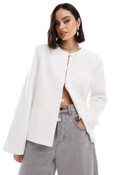 NA-KD linen collarless jacket in white