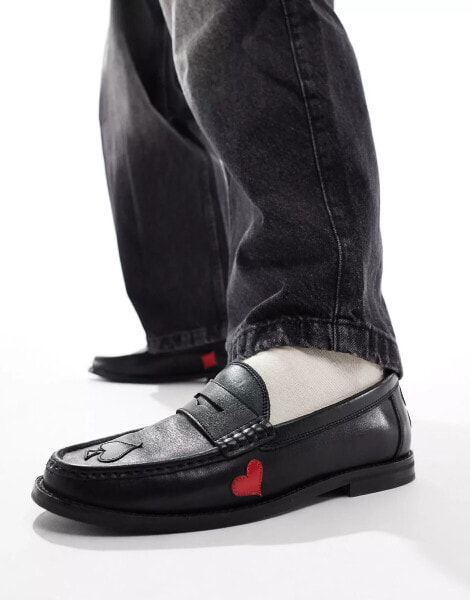 ASOS DESIGN black leather loafers with red and white detailing