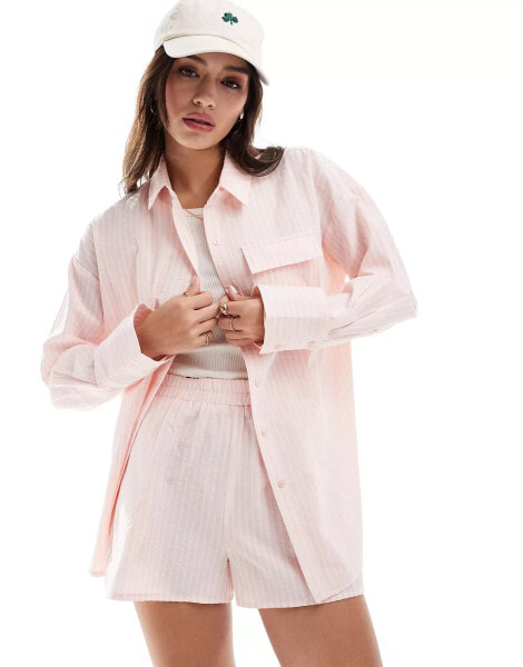 The Frolic raye oversized shirt in pink and white stripe