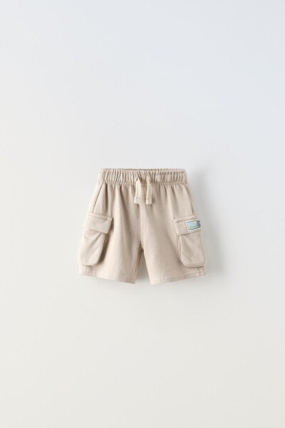 Cargo bermuda shorts with label
