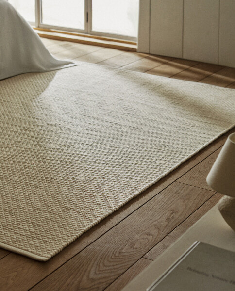 Rectangular wool rug with knots