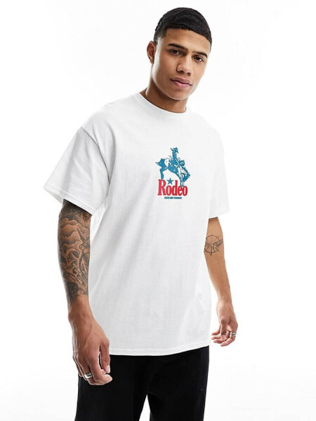 ASOS DESIGN oversized t-shirt in white with cowboy chest print