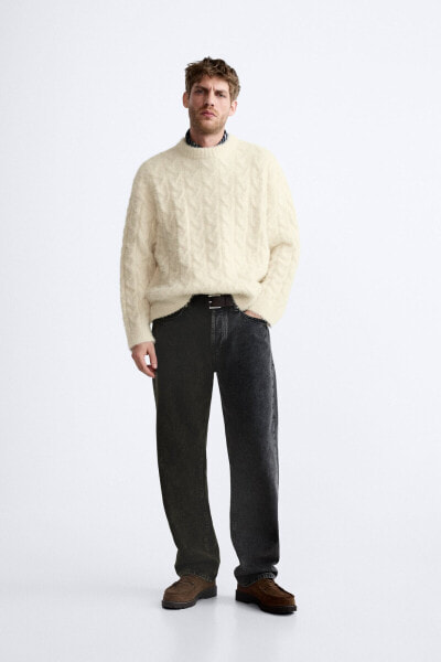 Textured cable-knit sweater