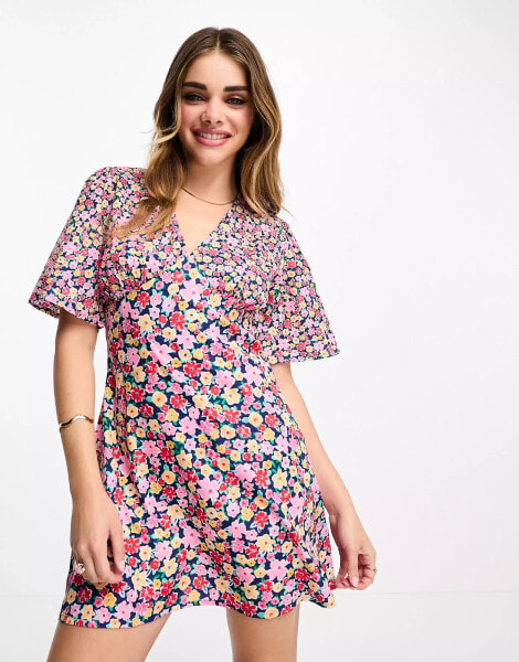 Wednesday's Girl flutter sleeve floral print mini dress in pink