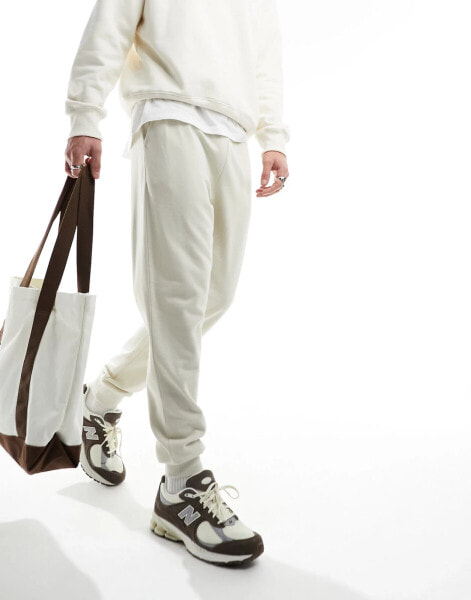 ASOS DESIGN tapered joggers in light beige