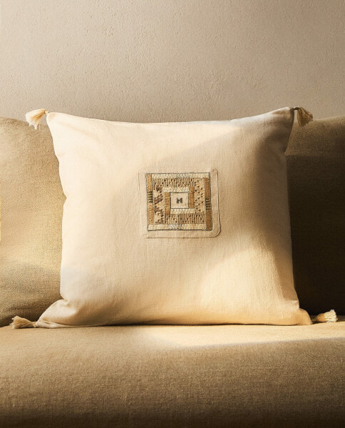 Cushion cover with tassels