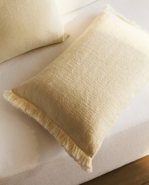 Fringed cushion cover