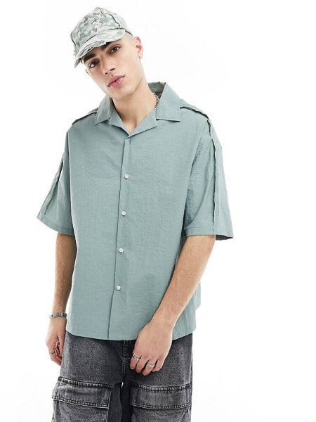 COLLUSION techy short sleeve revere shirt with raw seam detail in blue