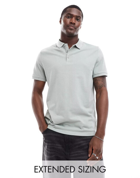 ASOS DESIGN pique polo shirt in washed green