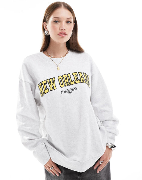 ASOS DESIGN oversized sweat with new orleans graphic in ice marl