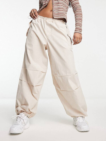 River Island low rise parachute cargo trouser in beige