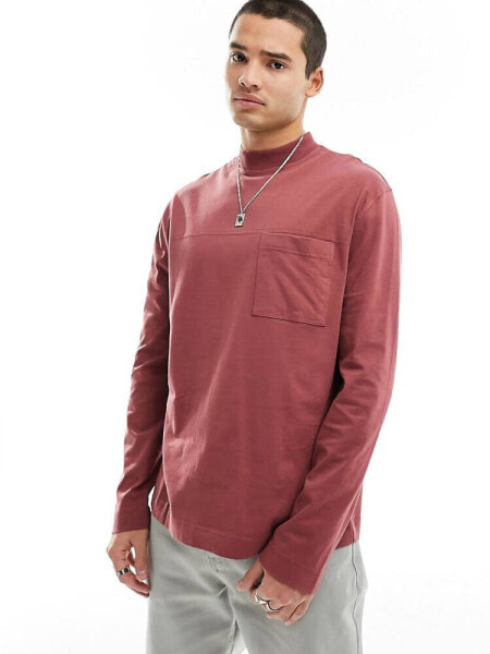 ASOS DESIGN long sleeved turtle neck t-shirt with pocket detail in washed burgundy