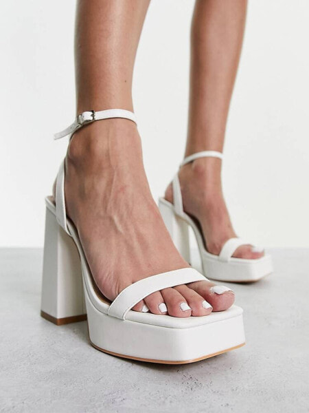 Glamorous platform heel sandals in white patent