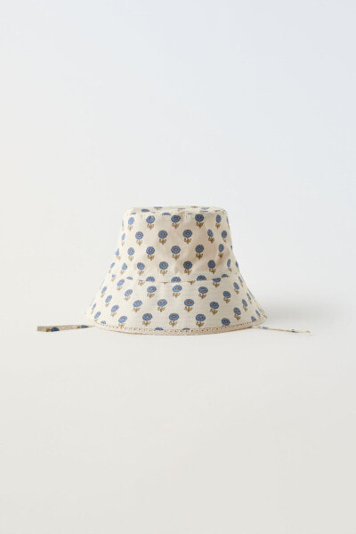 Reversible floral check bucket hat