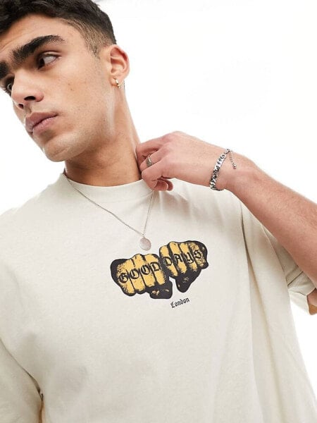 ASOS DESIGN oversized t-shirt in beige with knuckle chest print