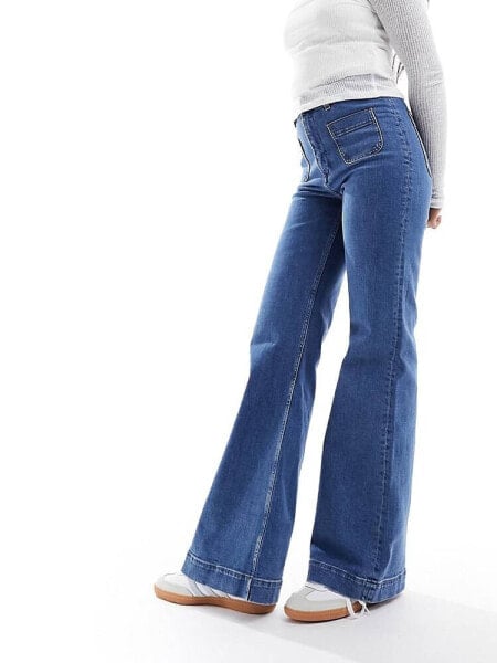 & Other Stories high waist flared jeans in mid blue