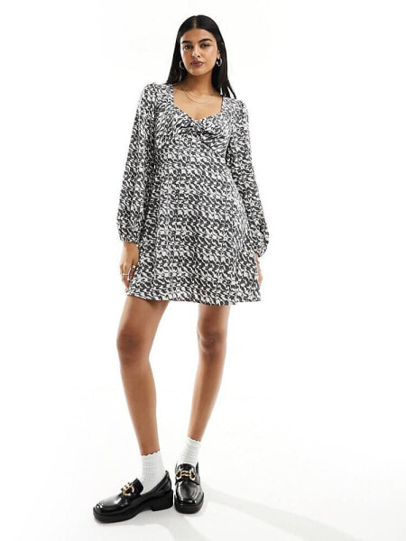 Pieces balloon sleeve mini tea dress in black and white print