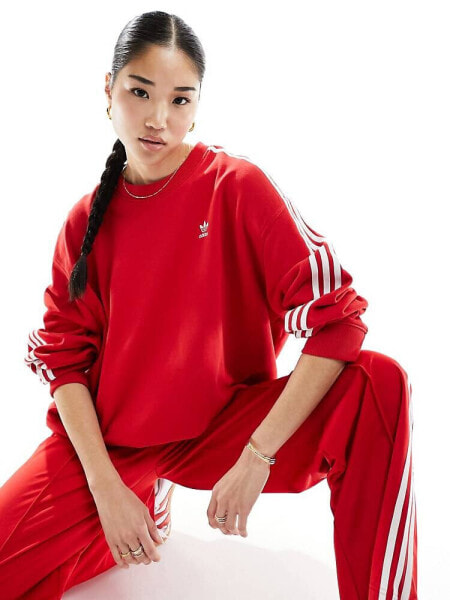 adidas Originals three stripe sweatshirt in red