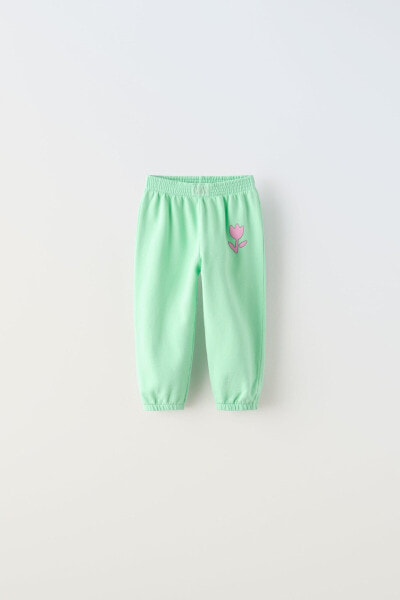 Faded-effect plush trousers
