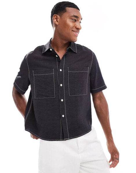 ASOS DESIGN relaxed boxy shirt with short sleeves and contrast stitch in black