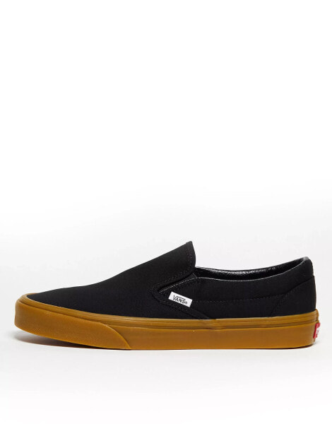 Vans classic slip on gum sole trainers in black