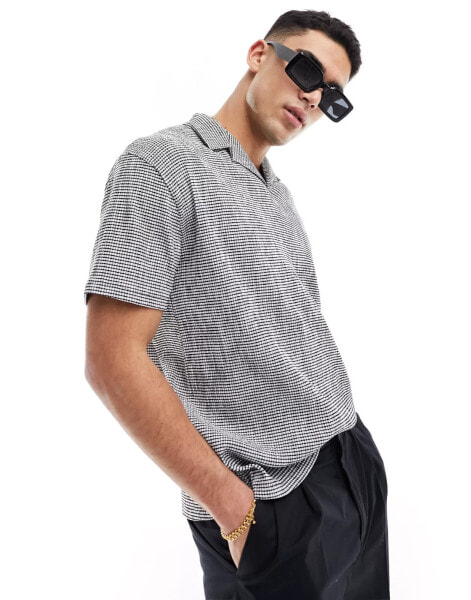 ASOS DESIGN relaxed polo shirt with revere collar in textured check