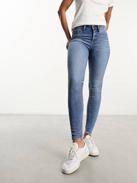 River Island sculpt skinny jeans in mid wash blue