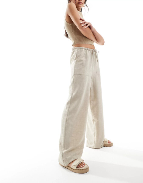 Vero Moda pull on wide leg trousers with tie waist in stone