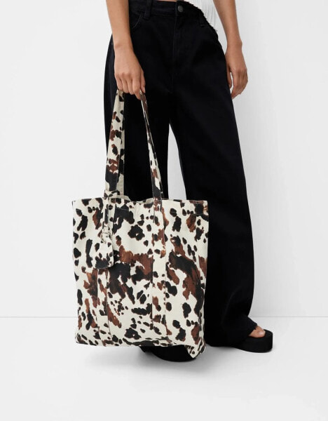 Bershka tote bag in brown cow print