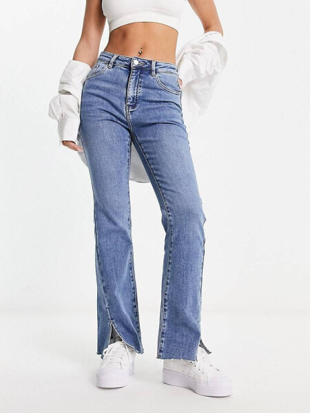 Urban Revivo split hem twisted hem flared jeans in blue