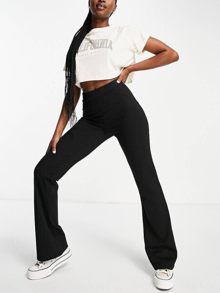 JDY high waisted flared trousers in black