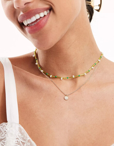 ASOS DESIGN pack of 2 necklaces with green bead and disk design