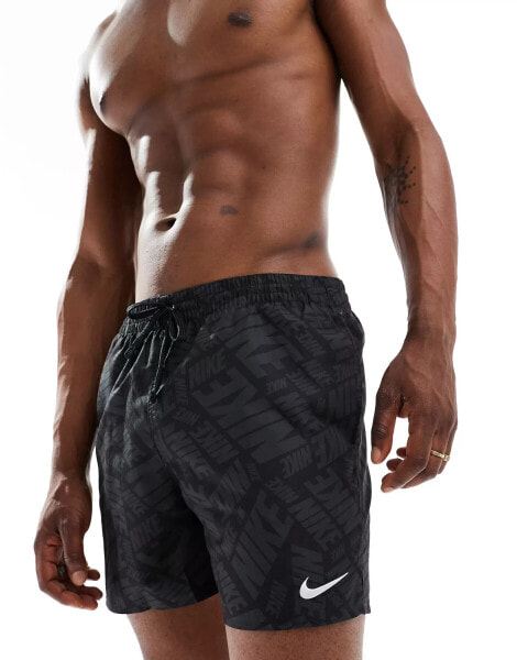 Nike Swimming Tossed Block 7 inch volley all over logo swim shorts in black