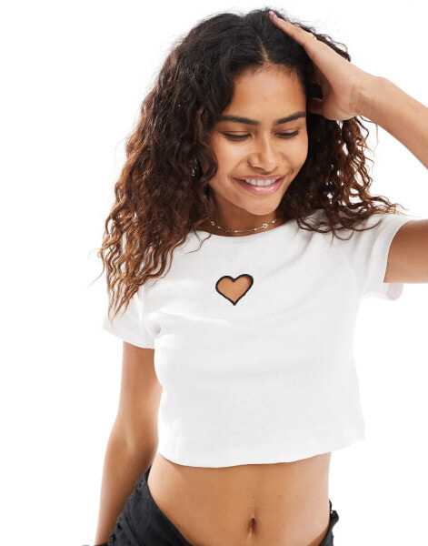 Noisy May cropped baby tee with heart cut out in white