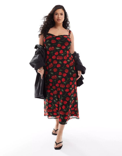 ASOS DESIGN Curve mesh peekaboo bust detail midaxi dress in red and black cherry print