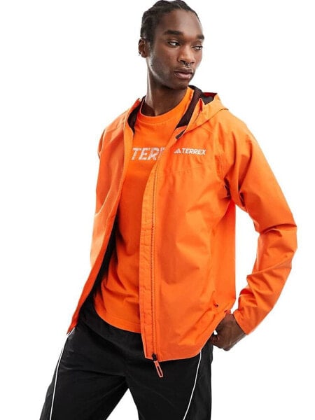 adidas Terrex outdoors waterproof jacket in orange