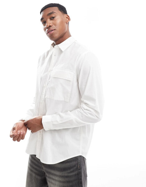 ASOS DESIGN relaxed shirt with double layered sleeve in white