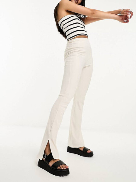 Bershka split hem flared trousers in ecru