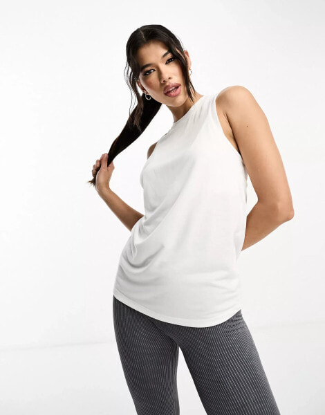 ASOS 4505 yoga vest with twist back in white