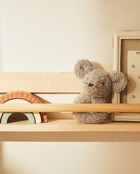 Children’s wooden shelf with front bar